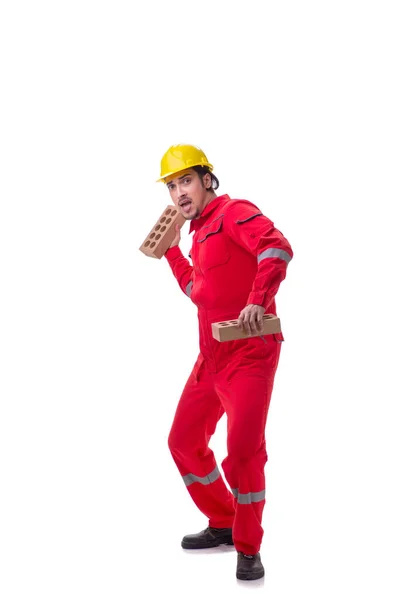 Jonge mannelijke metselaar met baksteen geïsoleerd op wit — Stockfoto