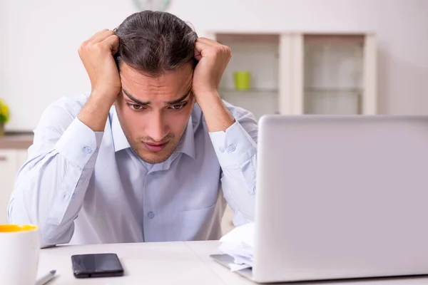 Young male businessman working at home — Stock Photo, Image