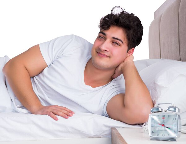 Man in bed suffering from insomnia