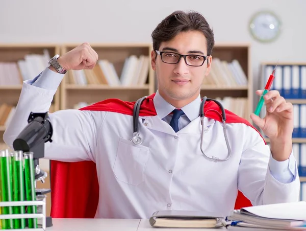 Superhero doctor working in the lab hospital — Stock Photo, Image