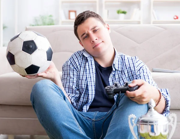 Young man playing computer games at home — Stock Photo, Image