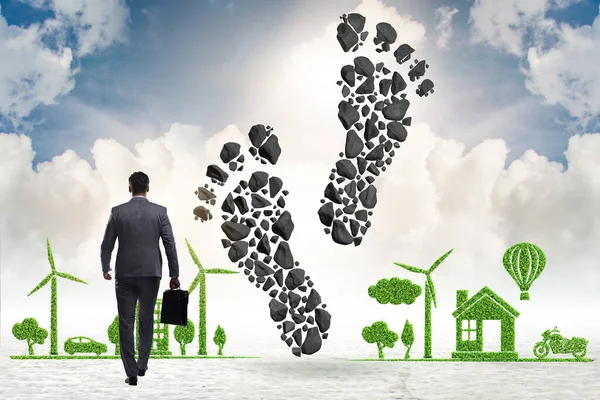 Carbon footprint concept met zakenman — Stockfoto