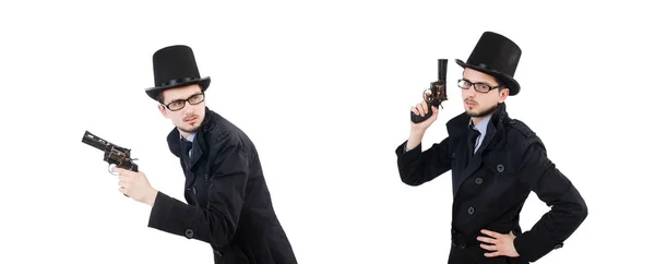 Giovane detective in cappotto nero con pistola isolata su bianco — Foto Stock