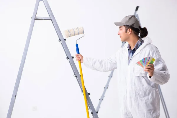 Painter working at construction site — Stock Photo, Image