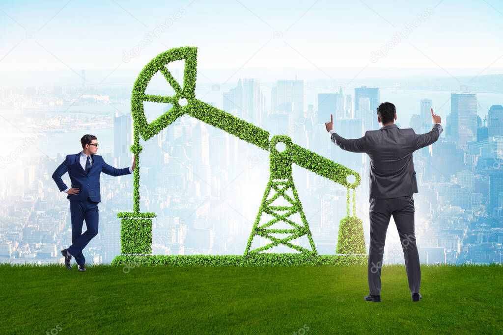 Businessman and green oil energy concept