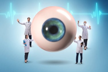 Doktor dev gözü tıbbi konseptte inceliyor.