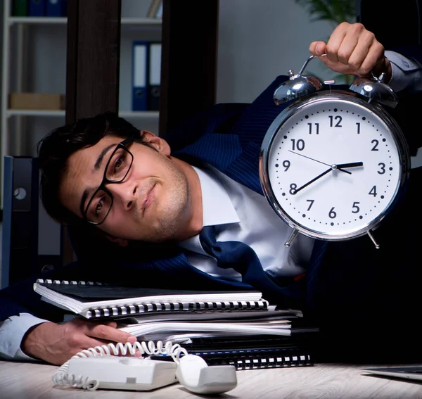 Businessman working overtime long hours late in office — Stock Photo, Image