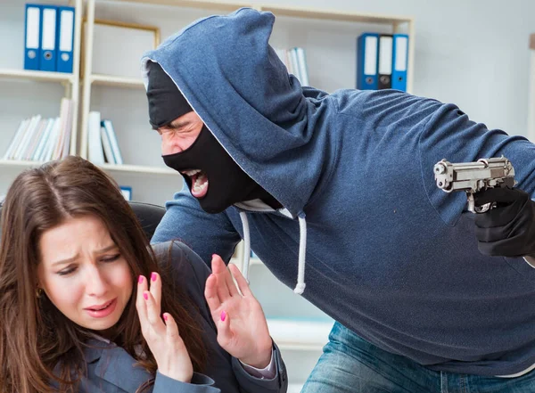 Criminal taking businesswoman as hostage in office — Stock Photo, Image