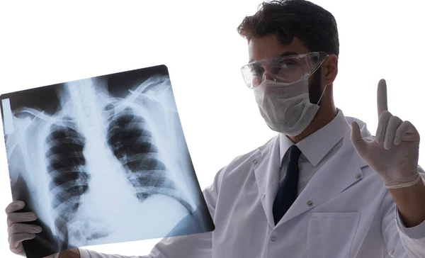 Junger Arzt betrachtet Röntgenbilder isoliert auf Weiß — Stockfoto