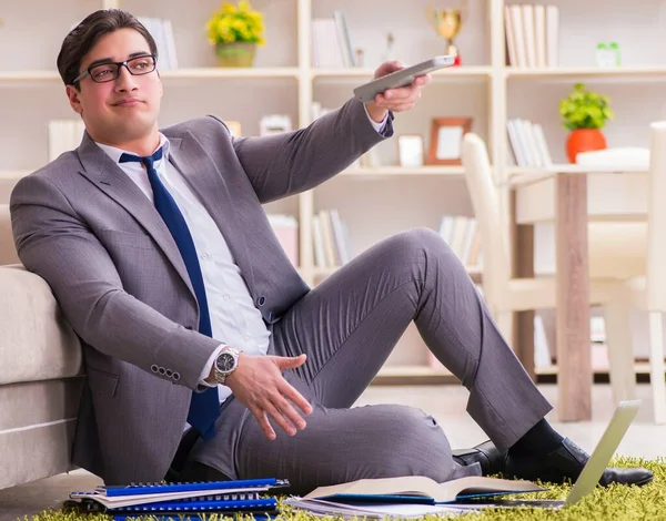 The businessman working on the floor at home — Stock Photo, Image