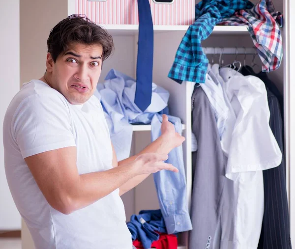 Man helpless with dirty clothing after separating from wife — Stock Photo, Image