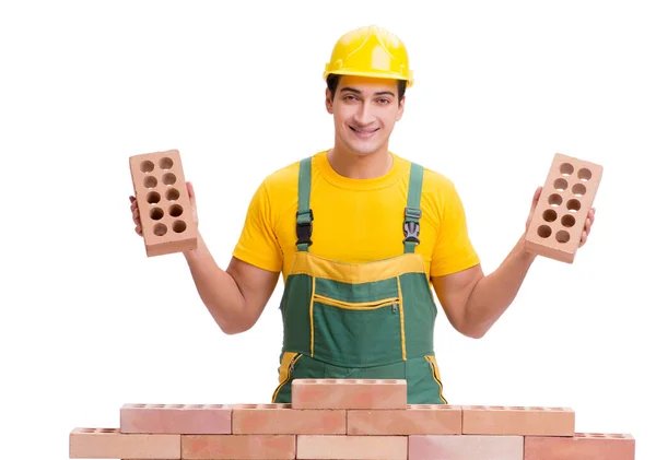 The handsome construction worker building brick wall — Stock Photo, Image