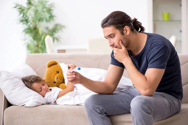 Father taking care of his ill daughter — Stock Photo, Image