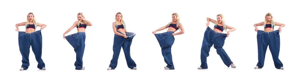 Woman in dieting concept with big jeans — Stock Photo, Image