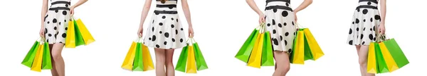 Mujer joven con bolsas de compras en blanco —  Fotos de Stock