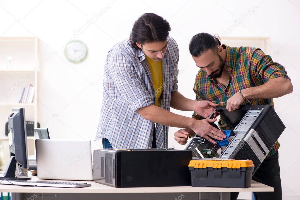 IT engineers working on hardware issue