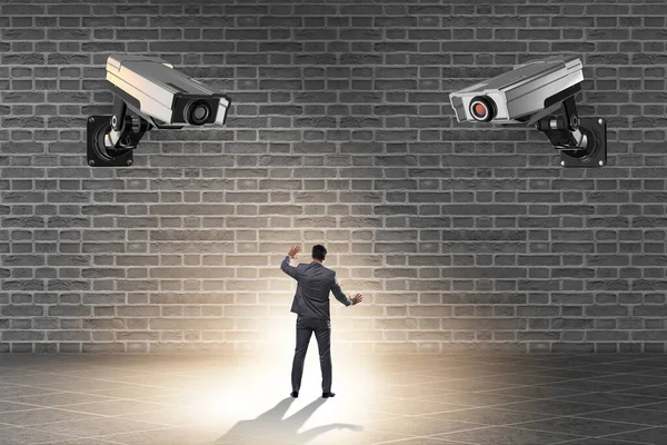 Cameras wathing man in spying concept — Stock Photo, Image