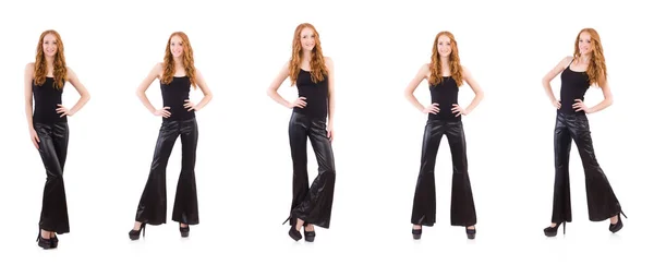 Redhead woman in black bell bottom pants on white — Stock Photo, Image