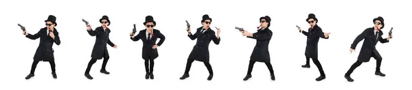 Młody detektyw w czarnym płaszczu trzymający pistolet odizolowany na białym — Zdjęcie stockowe