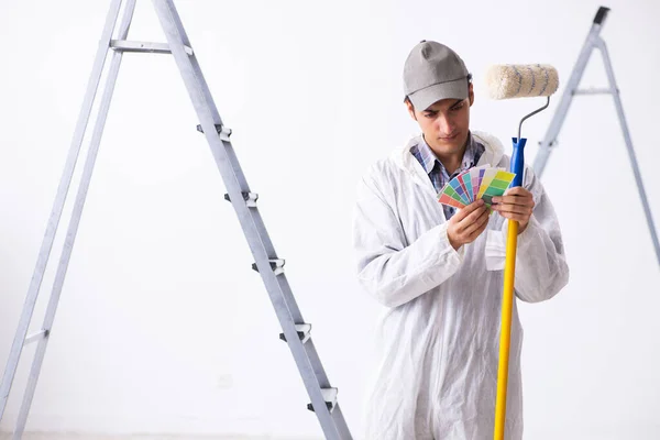 Painter working at construction site — Stock Photo, Image