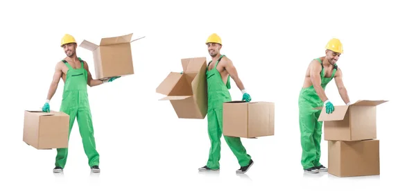 Homme en combinaison verte avec des boîtes — Photo