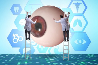 Doktor dev gözü tıbbi konseptte inceliyor.