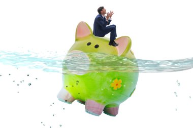 Piggybank ile borç konsepti içinde bir işadamı
