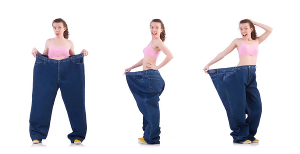 Mujer en concepto de dieta con jeans grandes — Foto de Stock