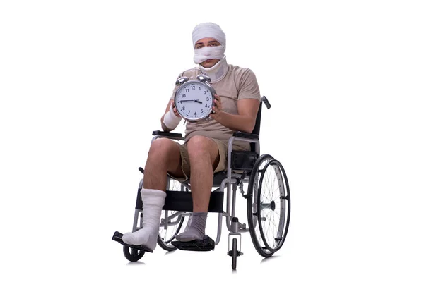 Injured man in wheel-chair isolated on white — Stock Photo, Image