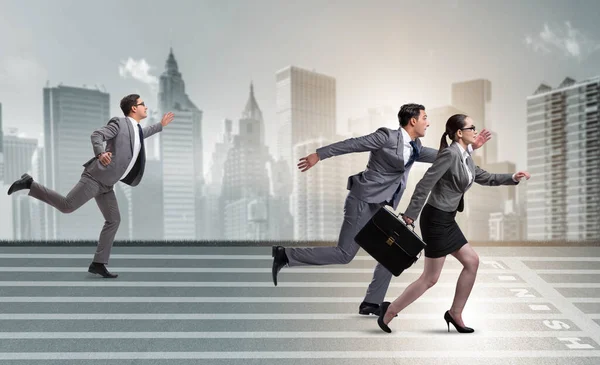 Businesspeople running in competition concept — Stock Photo, Image