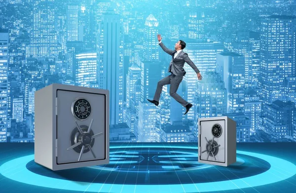 Бізнесмен стрибає з сейфів у бізнес-концепції — стокове фото