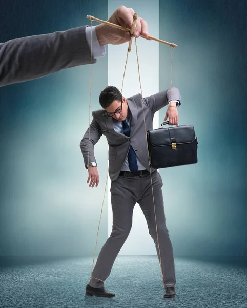 Businessman puppet being manipulated by boss — Stock Photo, Image