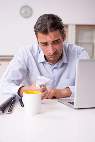 Young male businessman working at home — Stock Photo, Image