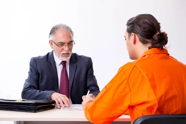 Young captive meeting with advocate in pre-trial detention