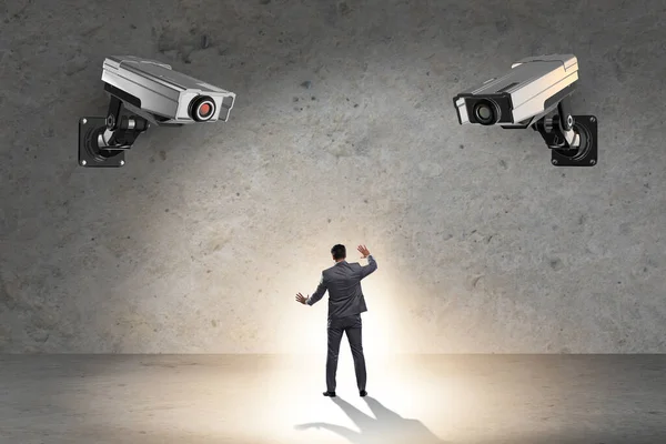 Cameras wathing man in spying concept — Stock Photo, Image