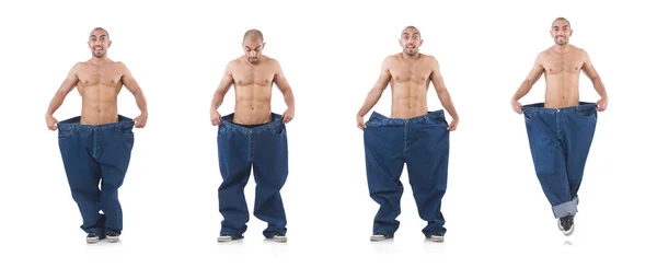 Uomo a dieta concetto con jeans oversize — Foto Stock