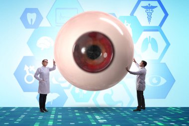 Doktor dev gözü tıbbi konseptte inceliyor.