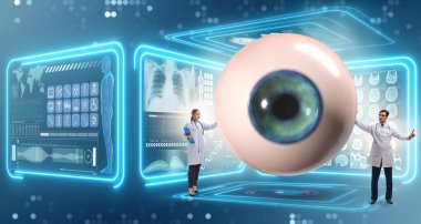 Doktor dev gözü tıbbi konseptte inceliyor.
