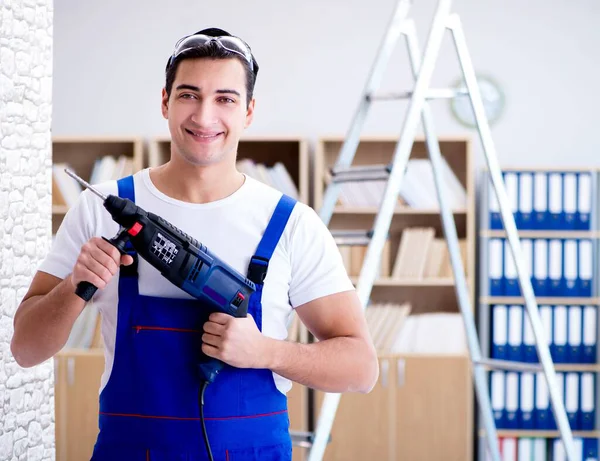 Werken met het boren van boor perforator reparateur — Stockfoto