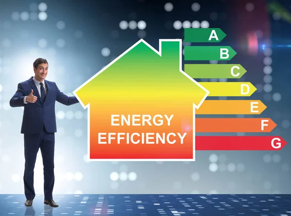 Üzletember az energiahatékonyság koncepciójában — Stock Fotó