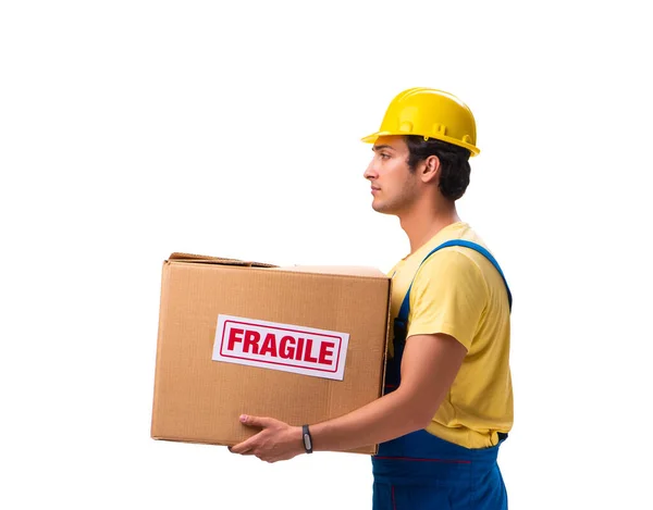 Junger Bauunternehmer mit fragilen Boxen auf weißem Grund — Stockfoto