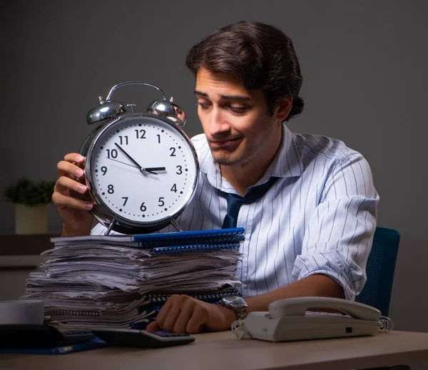 Young financial manager working late at night in office — Stock Photo, Image