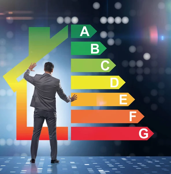 Empresario en concepto de eficiencia energética — Foto de Stock