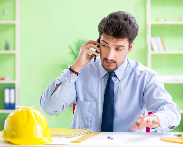 Young male architect working at the project — Stock Photo, Image