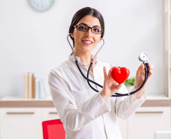 Young doctor in heart care concept — Stock Photo, Image