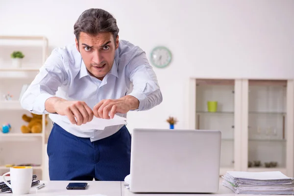 Young male businessman working at home — Stock Photo, Image