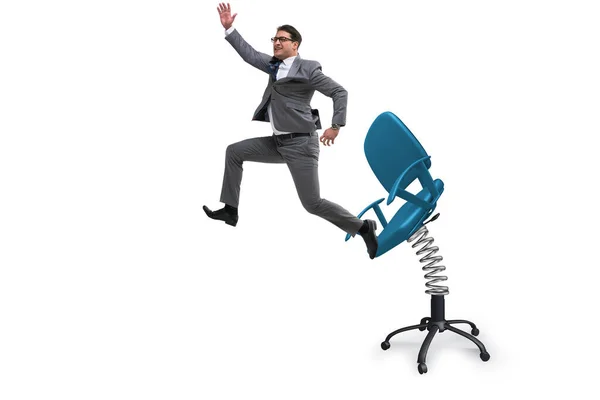 Promotion concept with businessman ejected from chair — Stock Photo, Image