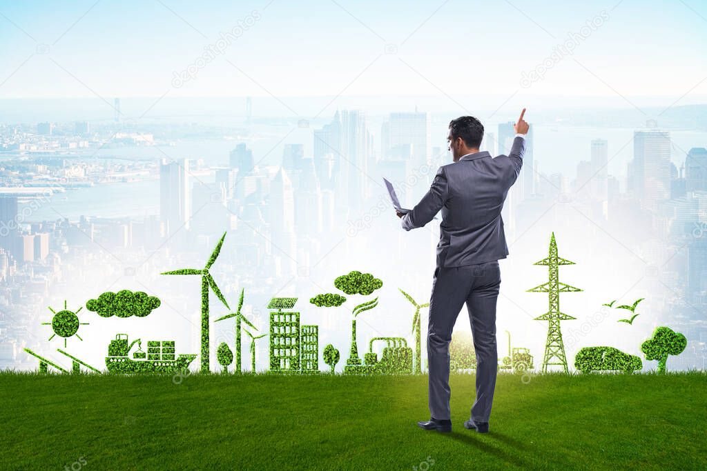 Businessman in green and environmental concept