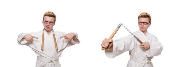 Divertido luchador de karate con nunchucks en blanco — Foto de Stock