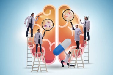 Doktor ekibi insan beynini inceliyor.